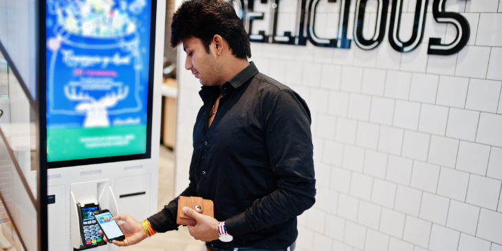 Man using digital signage.