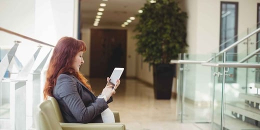 woman-in-the-office-with-a-tablet (1) (1)-3